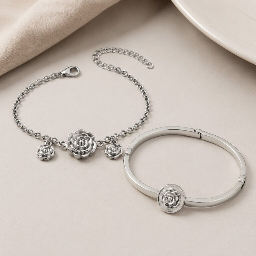 Rose charm bracelet and hinged bangle with functional closures