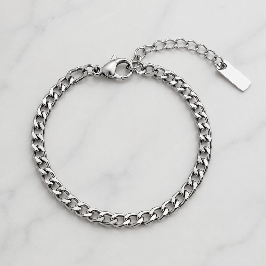 Polished stainless steel curb bracelet with extension chain and lobster clasp